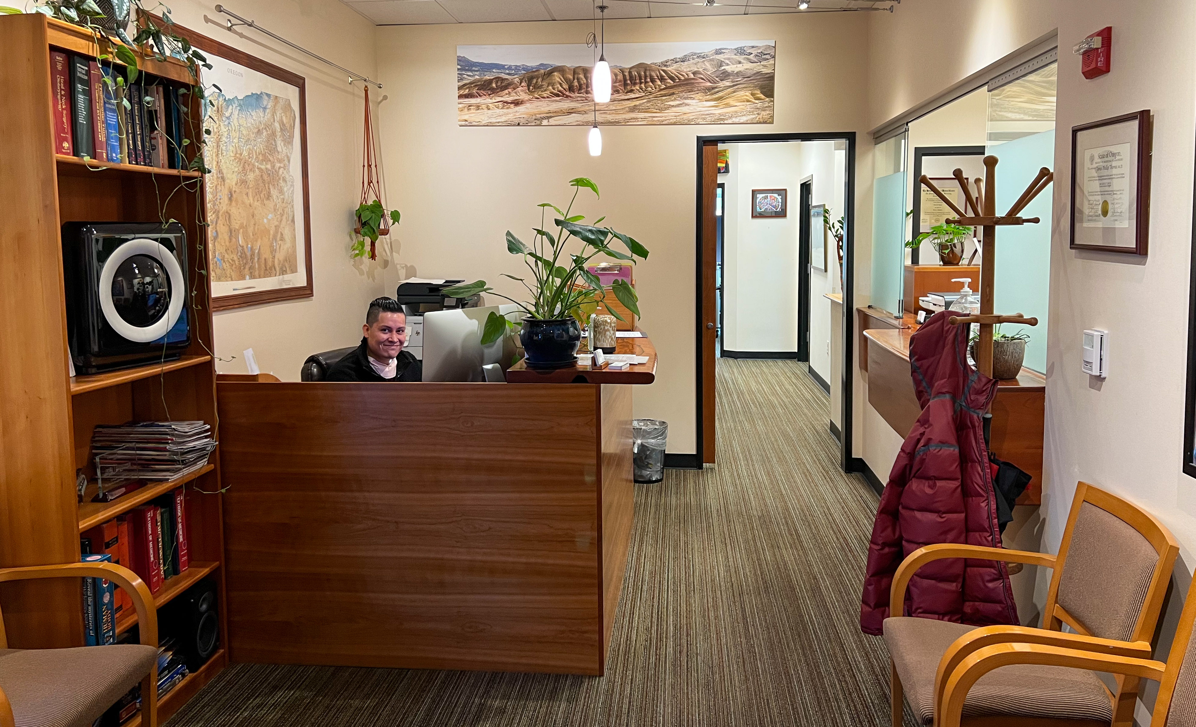 Reception desk and hallway leading to examination rooms